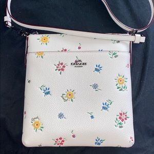 kitt messenger crossbody in wildflower print